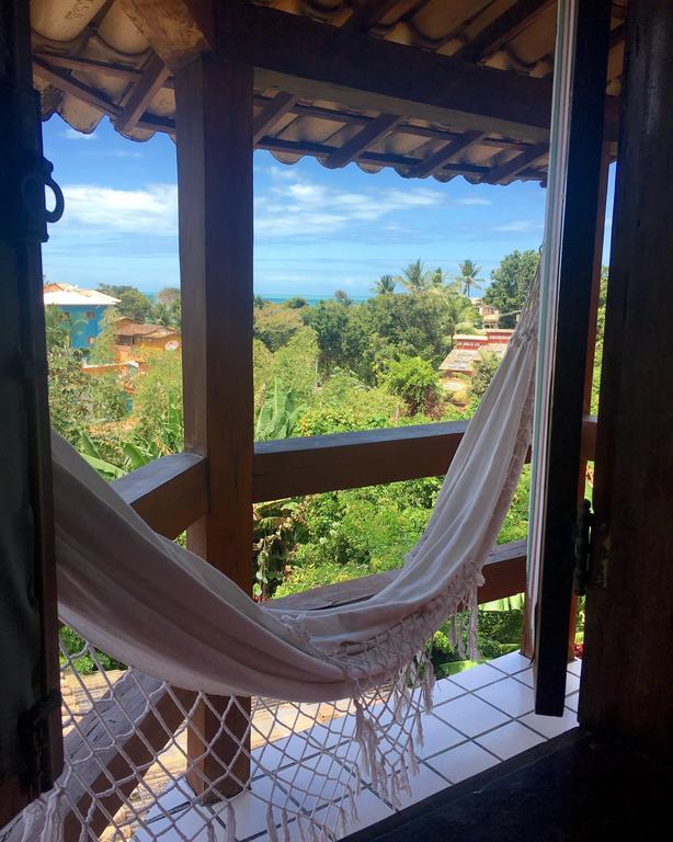 Novos Baianos Hostel E Pousada Порто Сегуро Екстериор снимка Hammock in a hotel in San Juan del Sur, Nicaragua